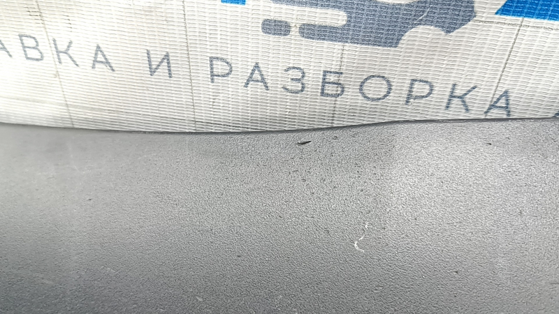 Upper left threshold of Tesla Model Y 20-25 structure, scratches