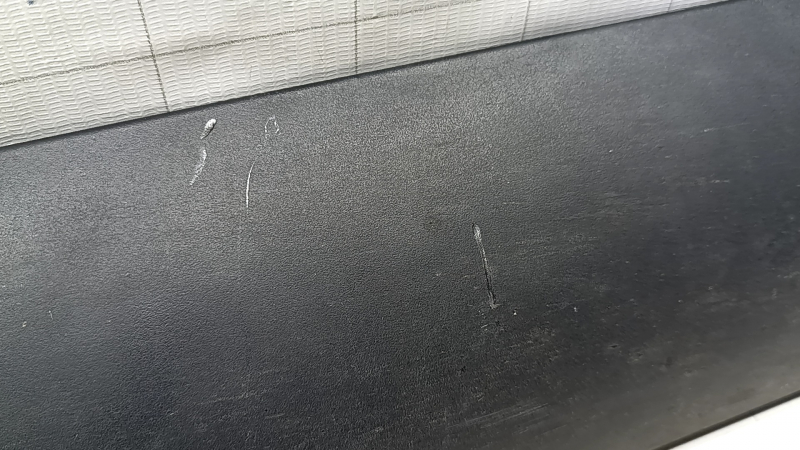 Tesla Model Y 20-25 upper right threshold structure, scratches