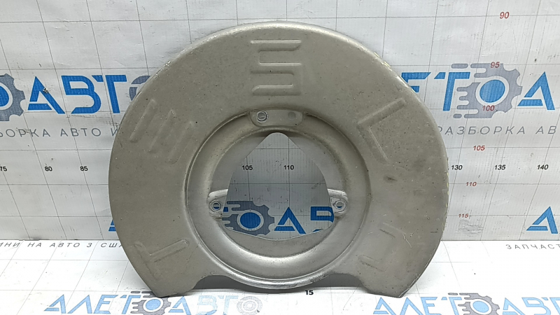 Tesla Model Y 20-25 front left brake disc cover is dented