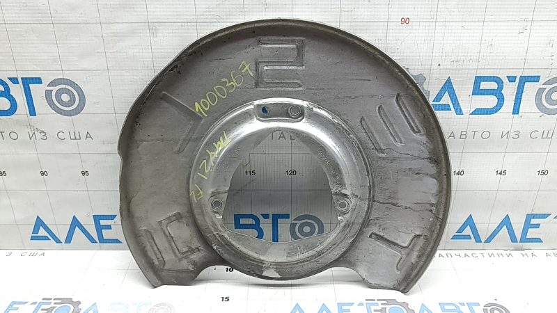 Tesla Model Y 20-25 front left brake disc cover is dented
