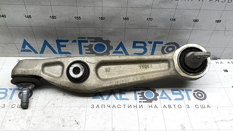 The lower front left control arm of Tesla Model Y 20-25 has a torn silent block