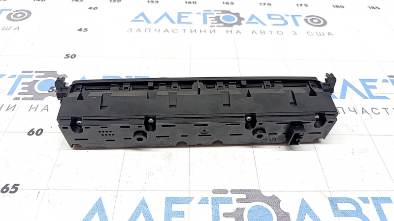 The chrome on the front panel button block of the Audi Q8 19-25 has peeled off