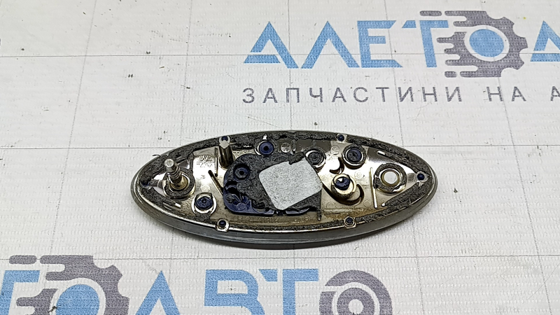 The FORD logo emblem of the Ford Edge 19-24 trunk door has a broken guide