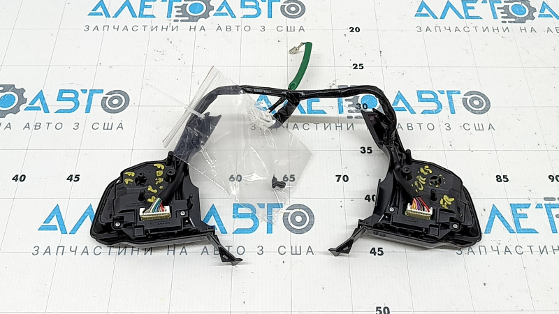 The control buttons on the steering wheel of a Subaru Forester 25-26 are broken