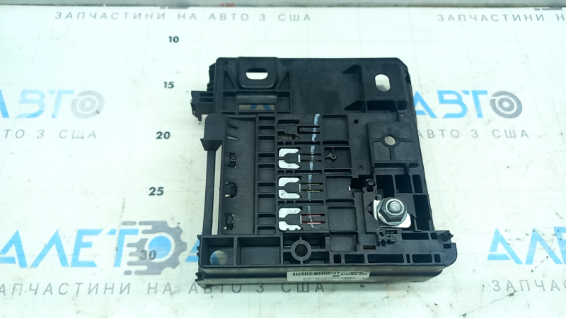 The underhood fuse box housing for Ford Escape MK4 20-26 has a broken mount