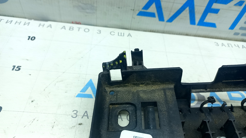 The underhood fuse box housing for Ford Escape MK4 20-26 has a broken mount