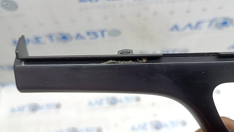 The front panel trim, climate control frame, Kia Niro 17-17, is black, covered in glue, has nicks and scratches
