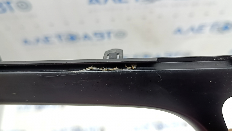 The front panel trim, climate control frame, Kia Niro 17-17, is black, covered in glue, has nicks and scratches