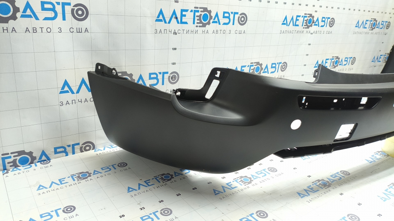 The rear bumper, bare middle section, Mazda CX-50 23-26, structure for parking sensors