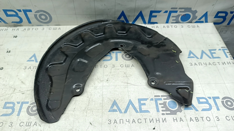 The front left brake disc cover of the Audi A3 22-26 is dented