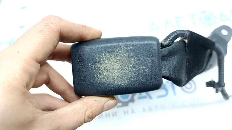 Rear seat belt latch 3rd row central Toyota Highlander 20-26 black, with sensor, worn