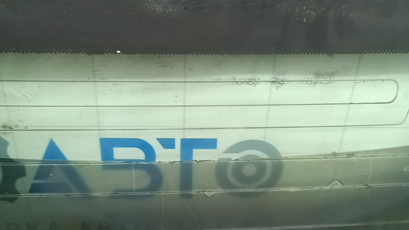 The rear window of the Audi A3 22-26 is covered in soot, the heating system is defective, and there is oxidation