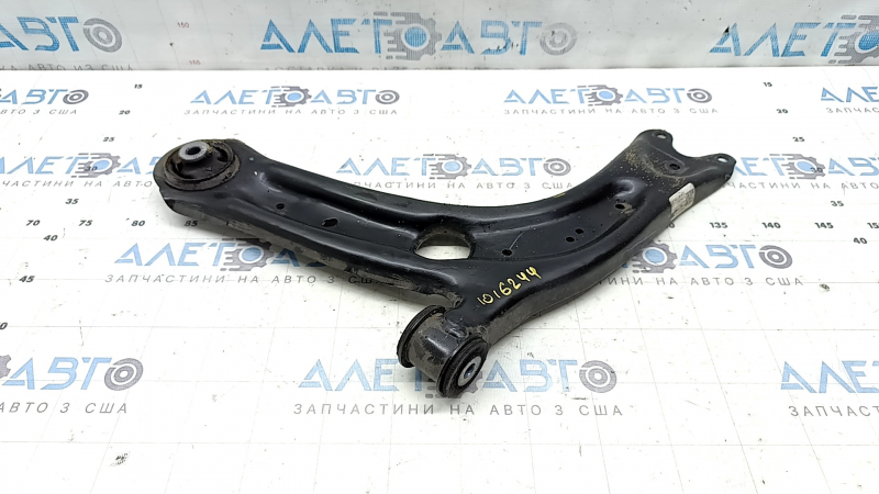 The lower front left control arm of a VW Taos 22-24 has a torn silent block