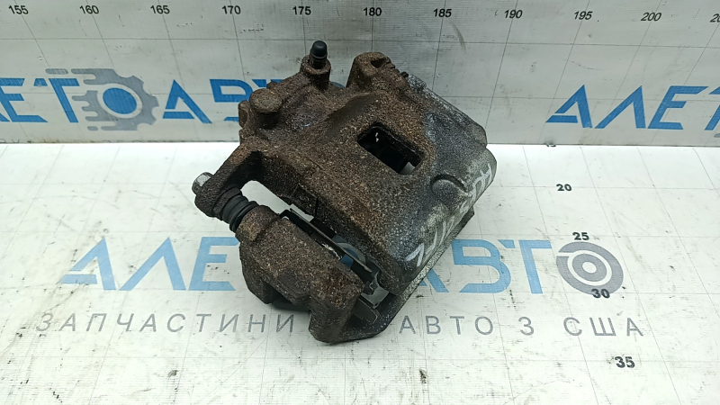 Front left caliper assembly Nissan Kicks 21-25 SR, SV rusty