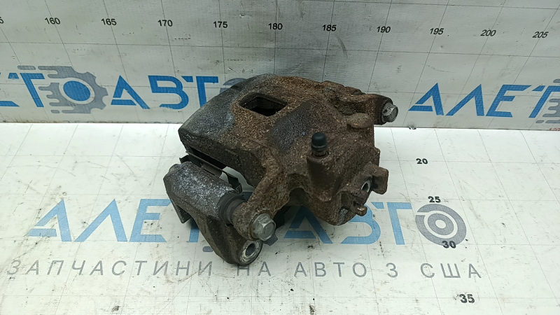 Front left caliper assembly Nissan Kicks 21-25 SR, SV rusty