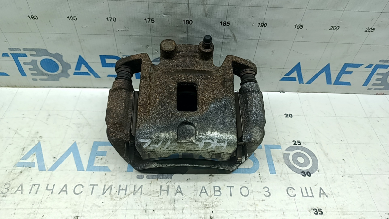Front left caliper assembly Nissan Kicks 21-25 SR, SV rusty