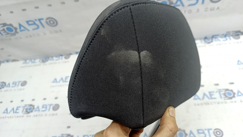 Headrest 2nd row left Kia Sportage 23-25 black cloth, dry cleanable