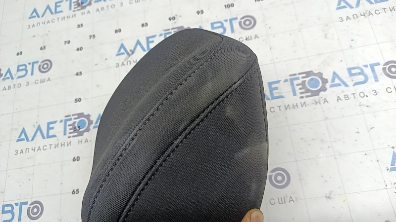 Headrest 2nd row left Kia Sportage 23-25 black cloth, dry cleanable