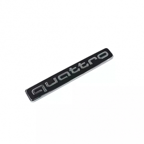 The QUATTRO emblem on the tailgate of the Audi Q8 19-25