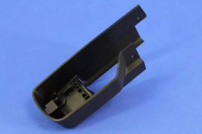 The rear left passenger seat runner trim for a Jeep Cherokee KL 14-23 is black, with a plug, scratches, and the plastic has turned white