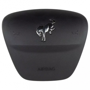 The steering wheel airbag for the driver's side of the Ford Bronco Sport 2021-2025 is black and has a rusty squib.