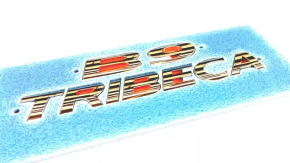 The Subaru b9 Tribeca trunk door emblem TRIBECA