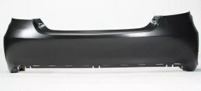 The rear bumper of a Toyota Camry V55 15-17 USA is black and dented, torn, and has broken fasteners.