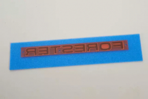 FORESTER emblem on the trunk door of a Subaru Forester 2008-2013