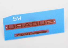 Subaru emblem on the trunk door of a Subaru Outback 10-14