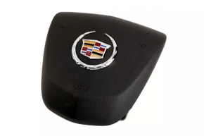 Airbag in the driver's steering wheel of a Cadillac CTS 14-15 pre-rest black shot